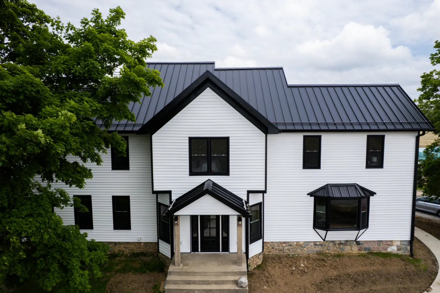 Storm-damaged siding documented in Wild Air